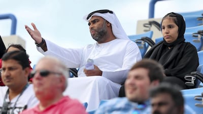 Fans watch the match between Stefanos Tsitsipas and Andrey Rublev at the Zayed Sports City in Abu Dhabi. Chris Whiteoak / The National