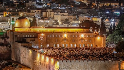 Palestinians attend prayers on the 27th day of Ramadan. EPA