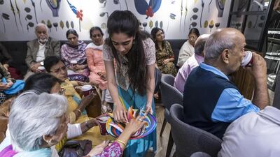Members of the Golden Age group enjoy quilling at Costa Cafe on Jumeirah Beach Road as part of the Alzheimer’s Cafe initiative. Talks, arts and crafts and workshops are planned to help address living with the condition. Antonie Robertson / The National