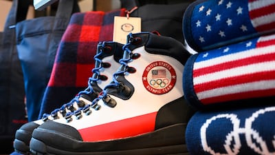 Team USA Beijing Winter Olympics footwear designed by Ralph Lauren is displayed in New York. Invision / AP