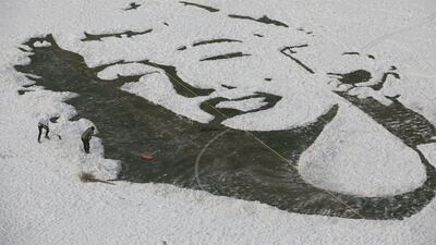 University students create an image of Marilyn Monroe by clearing snow off a football pitch, in Changchun, China. Reuters