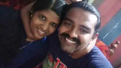 Chinchu Joseph with her husband and daughter in India.