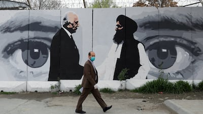 A mural in Kabul depicts Zalmay Khalilzad, the former US envoy in Afghanistan, and the Taliban’s Abdul Ghani Baradar. Photo: Reuters