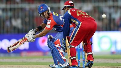 JP Duminy of Delhi Daredevils plays a shot during their IPL match against Royal Challengers Bangalore at Sharjah Cricket Stadium onApril 17, 2014. Pawan Singh / The National