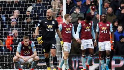 Dejected Aston Villa players after the late winner. Reuters