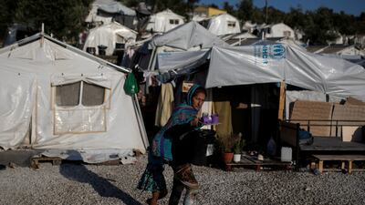 An Afghan migrant her daughter at a refugee camp on the Greek island of Moria, one of the common destinations for people entering the EU from Turkey. Reuters