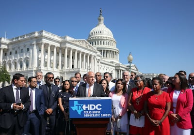Joined by fellow Texas state House Democrats, Chris Turner speaks during a news conference on voting rights outside the US Capitol on July 13, 2021 in Washington. AFP