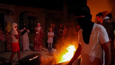 Residents protest in Zarzis, in Mednine governorate, southern Tunisia, at the treatment of the remains of migrants from the city who drowned trying to reach Europe. Ghaya Ben Mbarek for The National