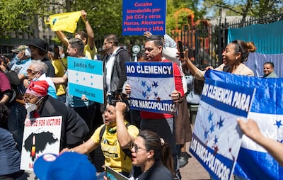 Protesters outside the US federal court where Juan Orlando Hernandez was due to appear after his extradition from Honduras, in May 2022. EPA