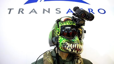 One of the military helmets on display at the air show. Leon Neal / AFP