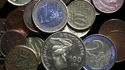 There are many vaguely plausible reasons for the euro, despite its drawn-out crisis, remaining so firm against the dollar so far. Louisa / Gouliamaki / AFP