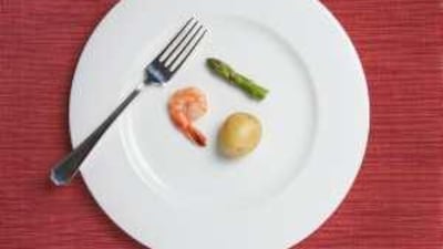 Cutting back on the calories may help us live longer and improve our minds.