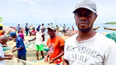 Mr Kamara in the coastal town on the outskirts of Freetown, where the livelihoods of fisherman are at risk. Andy Scott / The National