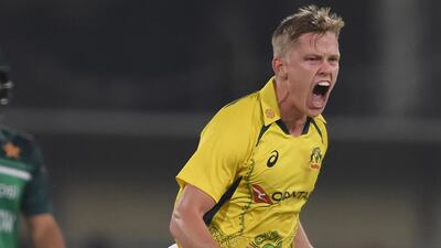 Australia's Nathan Ellis celebrates after taking the wicket of Pakistan's Imam-ul-Haq.