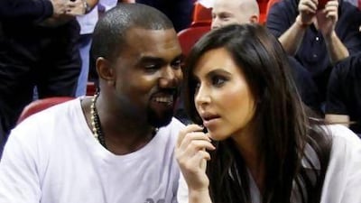 Kanye West and Kim Kardashian. AP