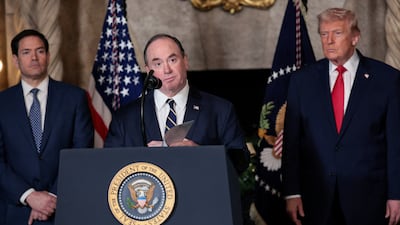 John Phelan, centre, will be replaced by Undersecretary of the Navy Hung Cao. Reuters