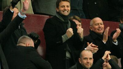 Aston Villa newly appointed manager Tim Sherwood, center, celebrates in the stands after Scott Sinclair scored against Leicester during their FA Cup fifth round match against Leicester City at Villa Park, Birmingham, England, Sunday, Feb. 15, 2015. (AP Photo/Rui Vieira)