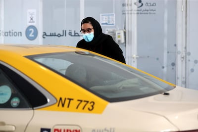 Noura attends to a visitor at the screening centre. Chris Whiteoak/The National