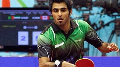 Rashid Omar, the UAE’s No 1 player, put on a brave display to beat Canada’s Pierre-Luc Hinse at Al Nasr Sports Club last night. Jeffrey E Biteng / The National