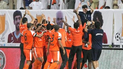 It was Ajman's first title win after 29 years and coach Abdulqadir could eventually celebrate following the tense game. Jaime Puebla / The National