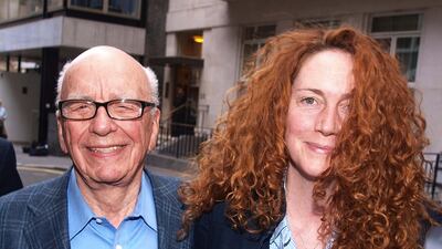 July 10, 2011: File - Chairman of News Corporation Rupert Murdoch, left, and Chief executive of News International Rebekah Brooks as they leave his residence in central London. Brooks resigned as Chief executive of News International Friday July 15, 2011???