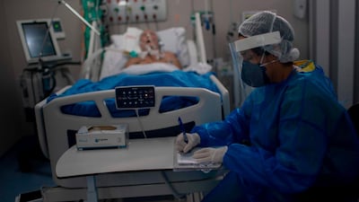A nurse works at the Intensive Care Unit ward where patients infected with coronavirus are being treated at the Doctor Ernesto Che Guevara Public Hospital in Marica city, state of Rio de Janeiro, Brazil. AFP