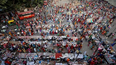 Shoppers crowd at a market ahead of the Hindu festival of Diwali in Ahmedabad, India. Reuters