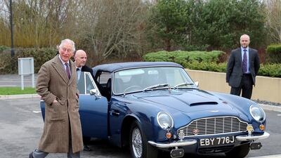 King Charles runs his Aston Martin DB6 Volante on English white wine and whey. Getty Images