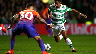 Scott Sinclair of Celtic runs with the ball under pressure form Nicolas Otamendi of Manchester City. Michael Steele / Getty Images