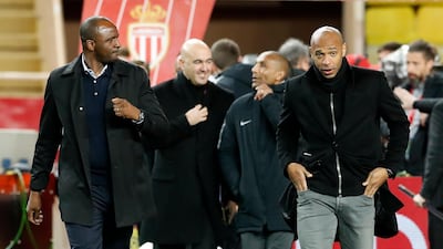 Nice manager Patrick Vieira, left, and Monaco manager Thierry Henry ahead of their game. Sebastien Nogier / EPA