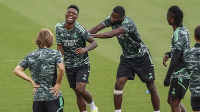 Real Madrid's Brazilian stiker Vinicius Jr. (2-L) jokes with German defender Antonio Rudiger (2-R), during the training of the team held at Valdebebas Sports City in Madrid, Spain, 13 September 2022 to prepare their next Champions League match against RB Leipzig. Real Madrid will lay against RB Leipzig on 14 September. EPA / RODRIGO JIMENEZ