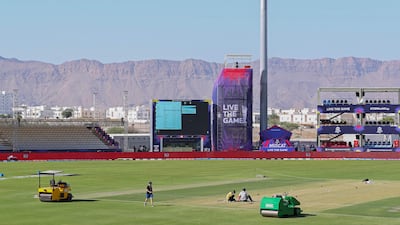 Workers prepare the Al Amerat Cricket Stadium in Oman's capital Muscat. The T20 World Cup gets underway in Oman and the UAE on Sunday. AFP