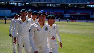 Steve Smith, centre, and David Warner, right, have resigned. Marco Longari / AFP