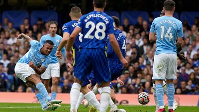 Manchester City's Gabriel Jesus, left, scores the only goal of the game against Chelsea at Stamford Bridge on Saturday, September 25, 2021. AP