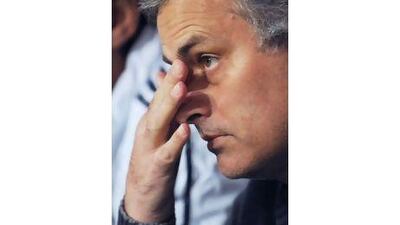 Real Madrid's Portuguese coach Jose Mourinho looks on before their Primera Liga match with Malaga at La Rosaleda stadium in Malaga.