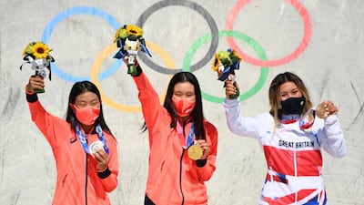 From left: Silver medalist Kokona Hiraki from Japan, gold medal winner Sakura Yosozumi from Japan and Great Britain's Sky Brown with her bronze medal.