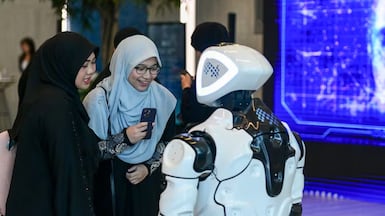 The UAE and Singapore report AI adoption levels above 54 per cent and 61 per cent, respectively, well above what their GDP per capita would predict. Khushnum Bhandari / The National