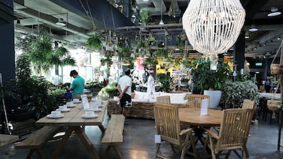 Outdoor furniture and plants for sale at the Garden Concept store in Dubai. Pawan Singh / The National