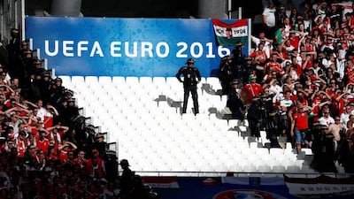 Riot police stand guard in the tribune during the Euro 2016 Group F football match between Iceland and Hungary at the Stade Velodrome in Marseille on June 18, 2016. Odd Andersen / AFP