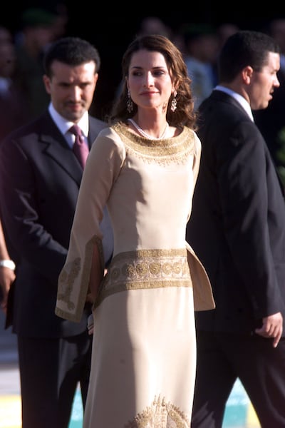 Queen Rania wore an understated dress for Independence Day celebrations in 2002. Getty Images