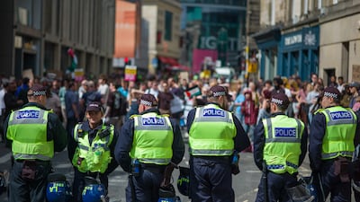 Police watching an anti-racism protest in Newcastle Upon Tyne remain on high alert despite a calming of recent unrest in Britain. Getty Images