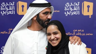Sheikh Mohammed bin Rashid congratulates Fatma Al Nuaimi for her part in the Arab Reading Challenge. Wam