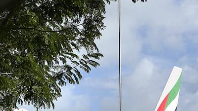 An Emirates plane stands parked at the airport in Victoria, the Republic of Seychelles’ capital on Mahe island. Silvia Razgova / The National