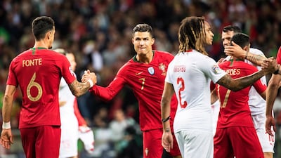 Ronaldo shakes hands with his teammate Jose Fonte at the final whistle. EPA