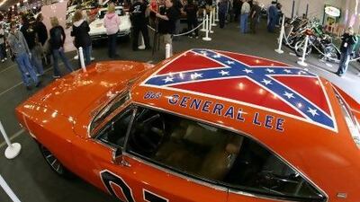 The Dodge Charger known as General Lee in The Dukes of Hazzard, seen here at an auction in Scottsdale, Arizona, is one of the more popular cars that enthusiasts like to replicate. Gabriel Bouys / AFP