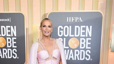 Molly Sims wears Tony Ward. Getty Images