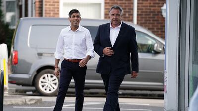 Prime Minister Rishi Sunak with new Conservative MP Steve Tuckwell in Uxbridge on Friday morning. PA