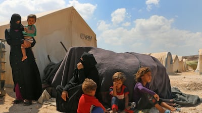 In this file photo, displaced Syrians are seen at a camp inear the Bab al-Hawa border crossing with Turkey in Idlib on September 6, 2018. AFP