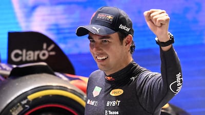 Mexican driver Sergio Perez celebrates. AFP