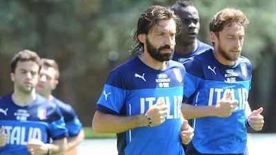 Andrea Pirlo, Mario Balotelli and Claudio Marchisio shown training with Italy in Florence on May 20, 2014. Maurizio Degl’Innocenti / EPA